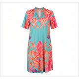 Angelle Milan Travelstof Jurk - Turquoise Koraal Bloemenprint