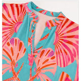 Angelle Milan Travelstof Jurk - Turquoise Koraal Bloemenprint 
