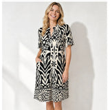 angelle milan travelstof jurk 1467 zwart/witte tropisch print 